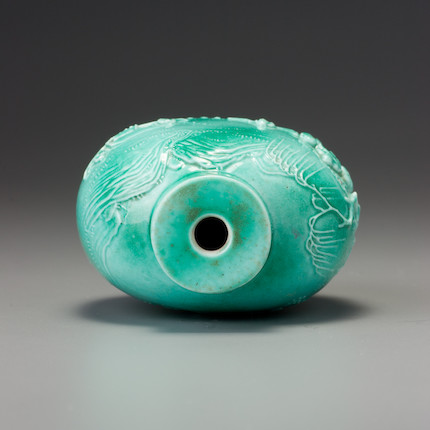 Bonhams : A turquoise porcelain carved 'landscape' snuff bottle