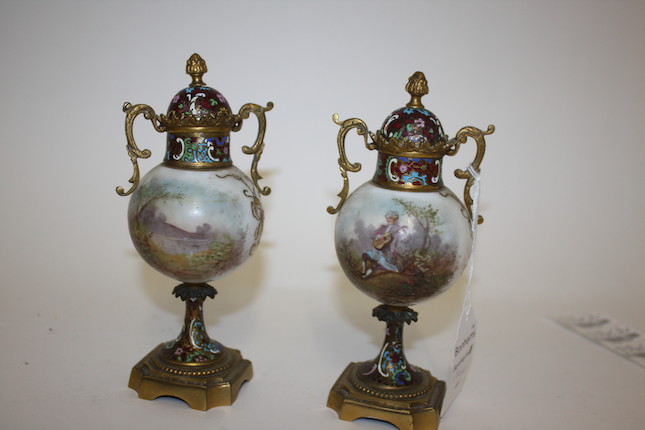 Bonhams : A pair of French champleve gilt-metal mounted porcelain