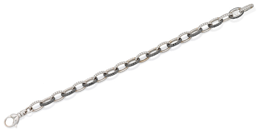 Bonhams : A diamond and black diamond bracelet, by Theo Fennell