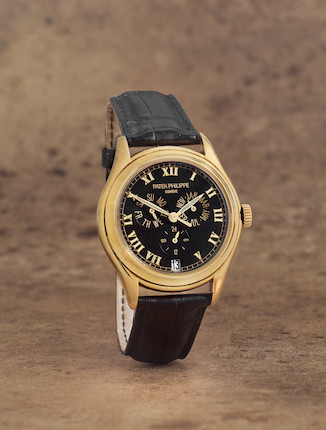 Bonhams : Patek Philippe. A fine 18K gold automatic annual calendar  wristwatch with 24 hour indication Ref 5035J-010, Purchased 7th April 2000
