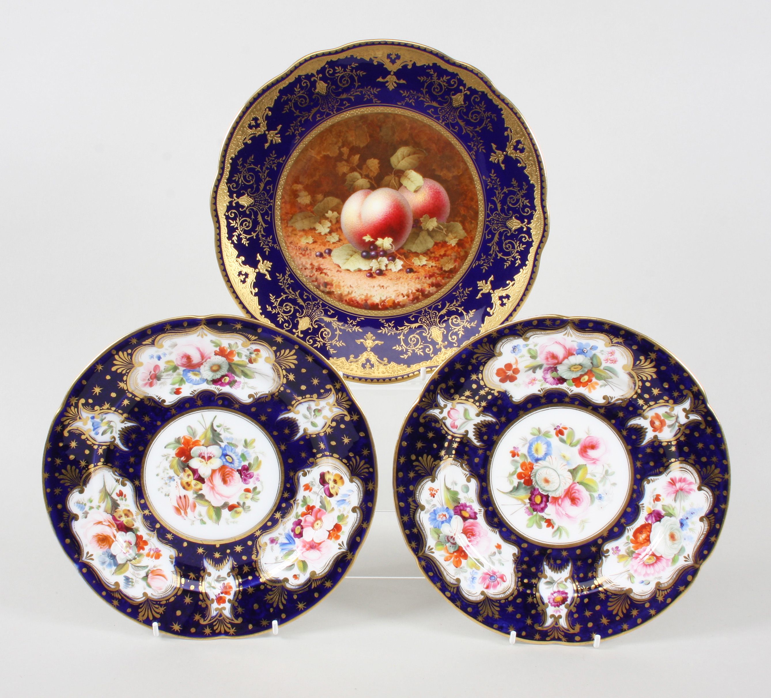 Bonhams : A Coalport plate by F Howard, and a pair of Coalport plates
