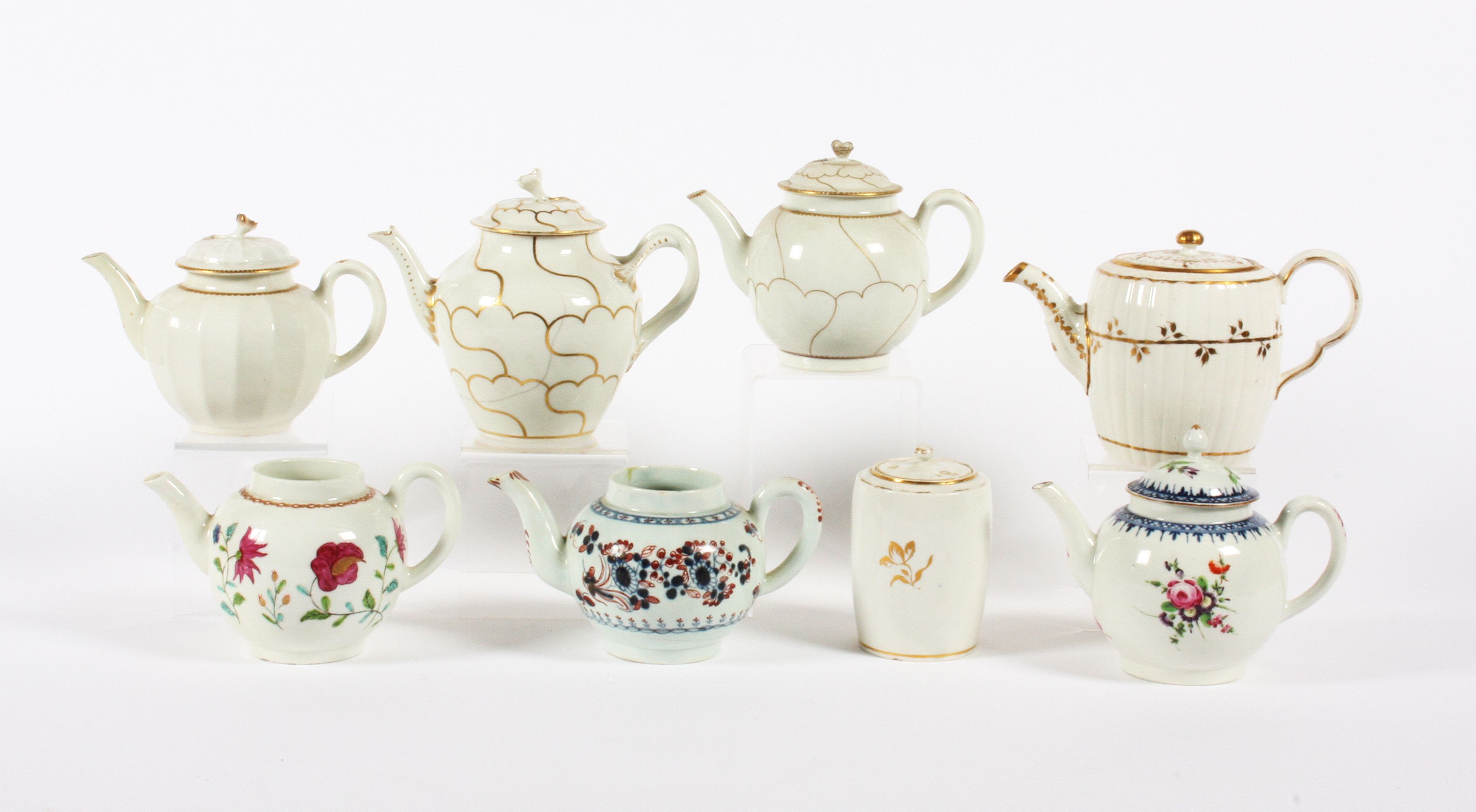 Bonhams Four Worcester teapots and covers, an odd teapot, a tea