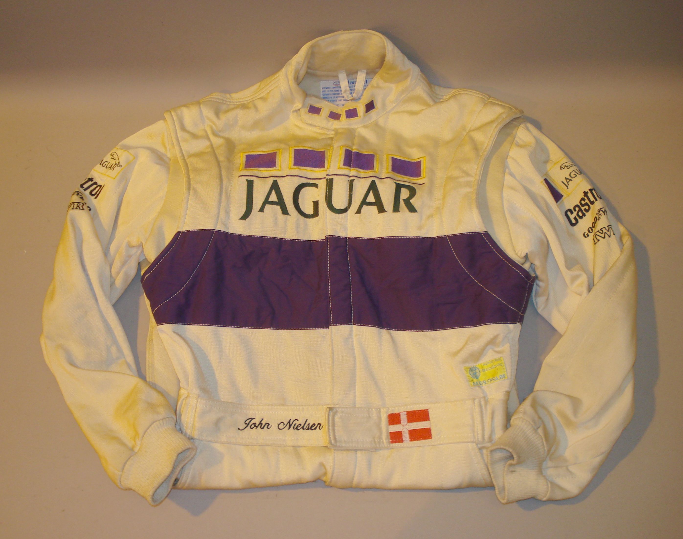 Bonhams Cars A used Stand 21 Jaguar drivers racing suit and gloves,
