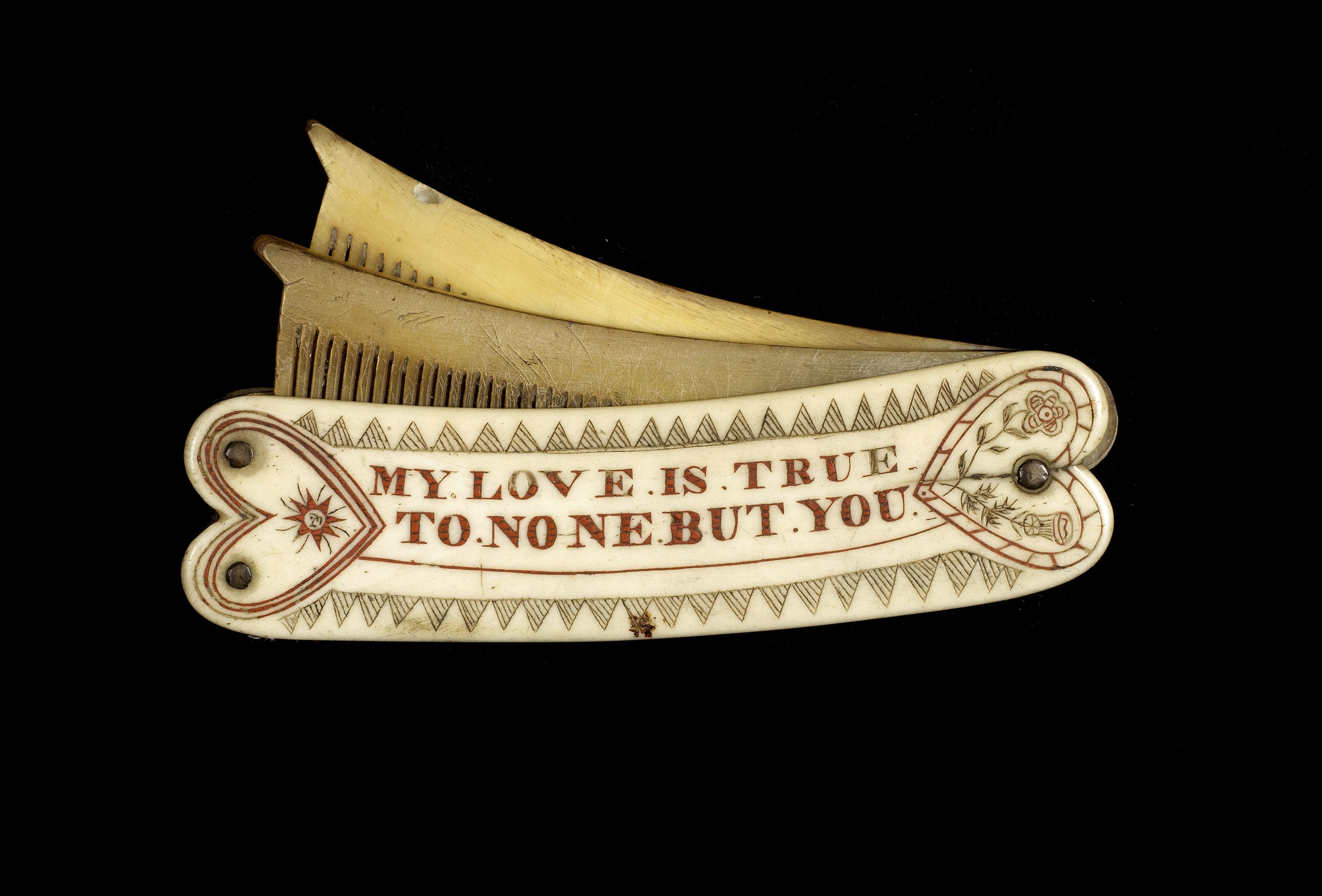 Bonhams : A very rare scrimshawed and polychromed double comb love token,  4.75in (12 cm) long