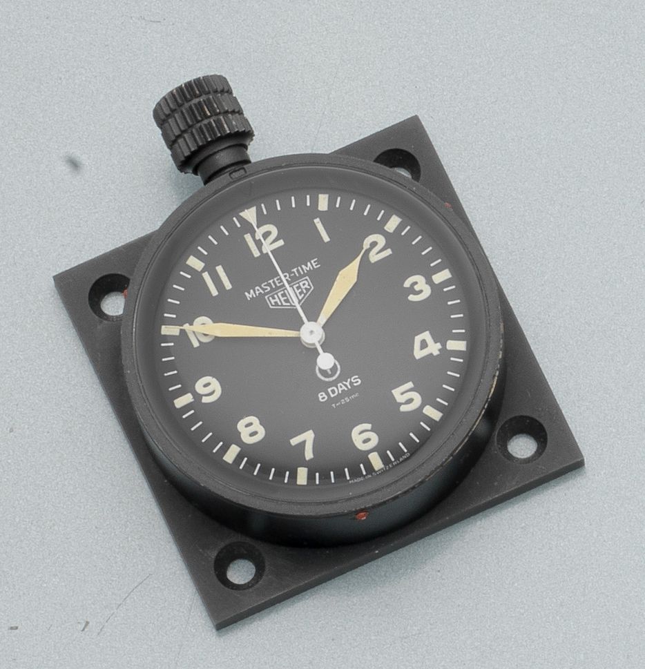 Bonhams A black finished military issue 8-day dashboard