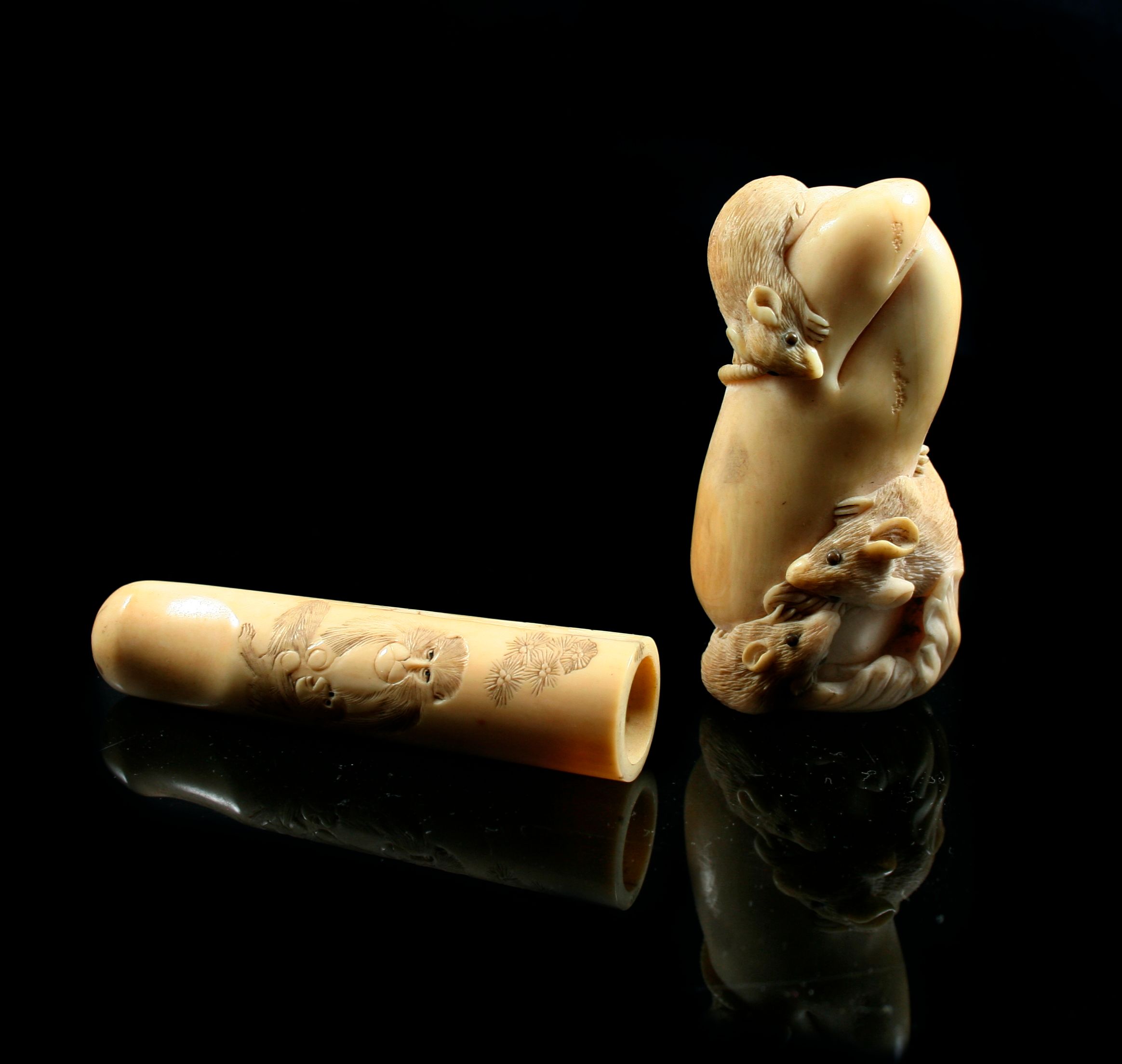Bonhams A Japanese carved ivory knife handle and ivory cigar holder