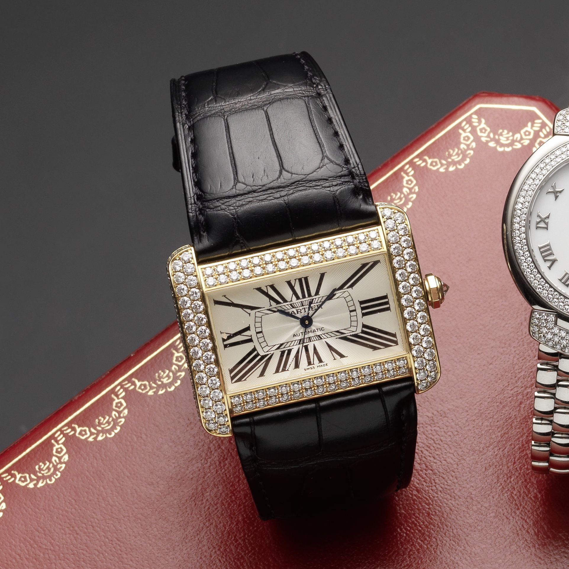 Bonhams An 18ct gold and diamond set automatic