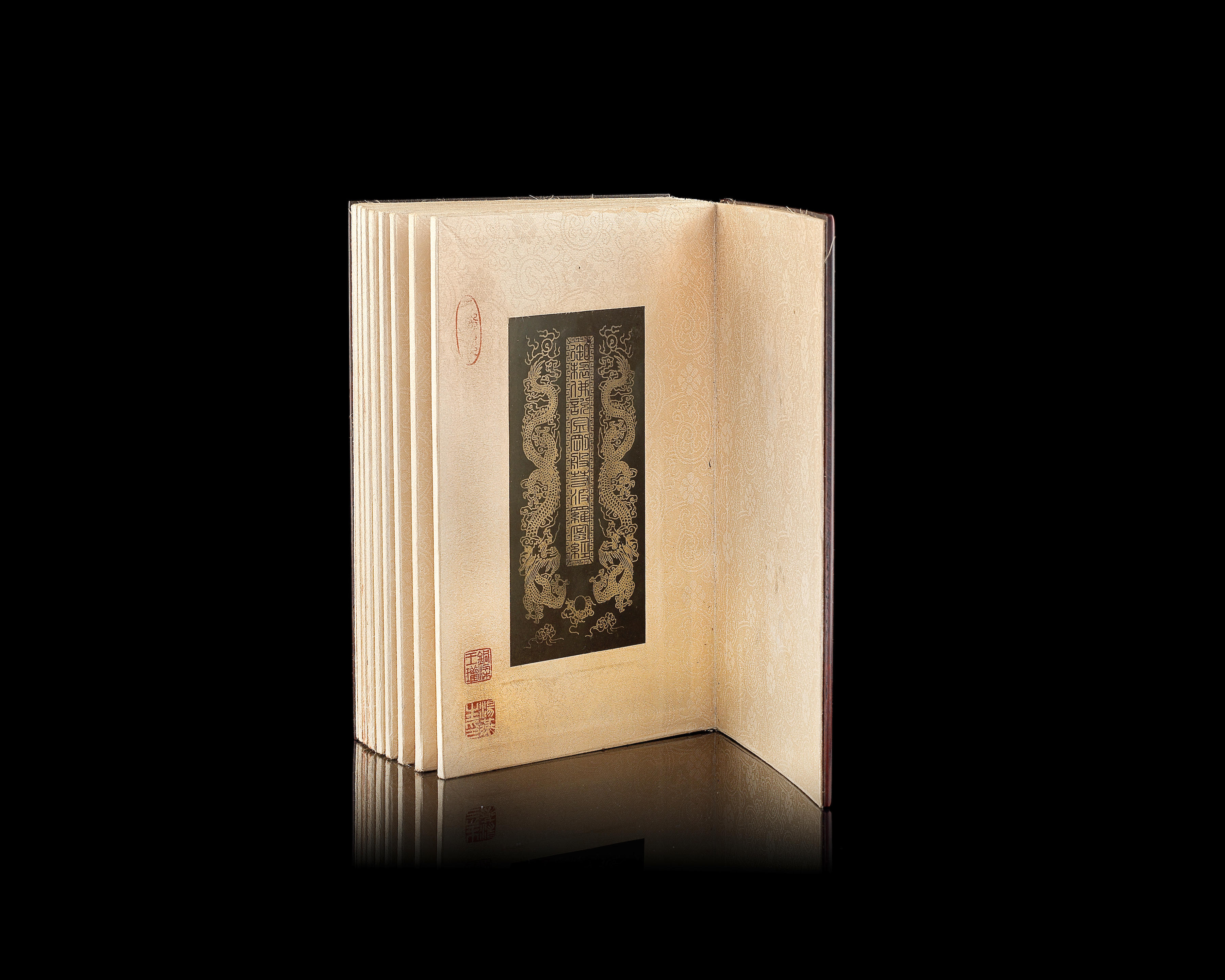 Bonhams : A spinach green jade sutra book