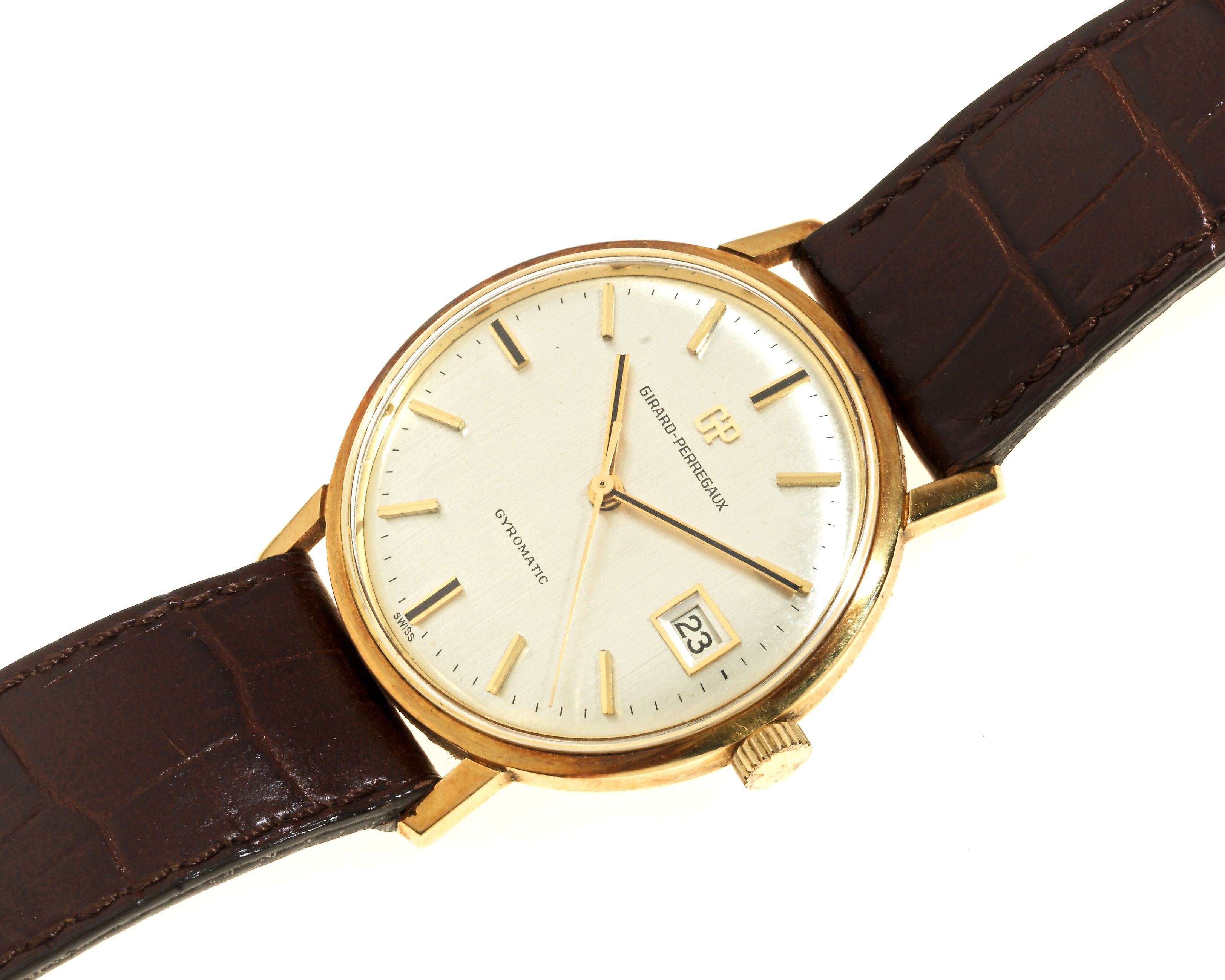 Bonhams Girard An 18K gold automatic calendar