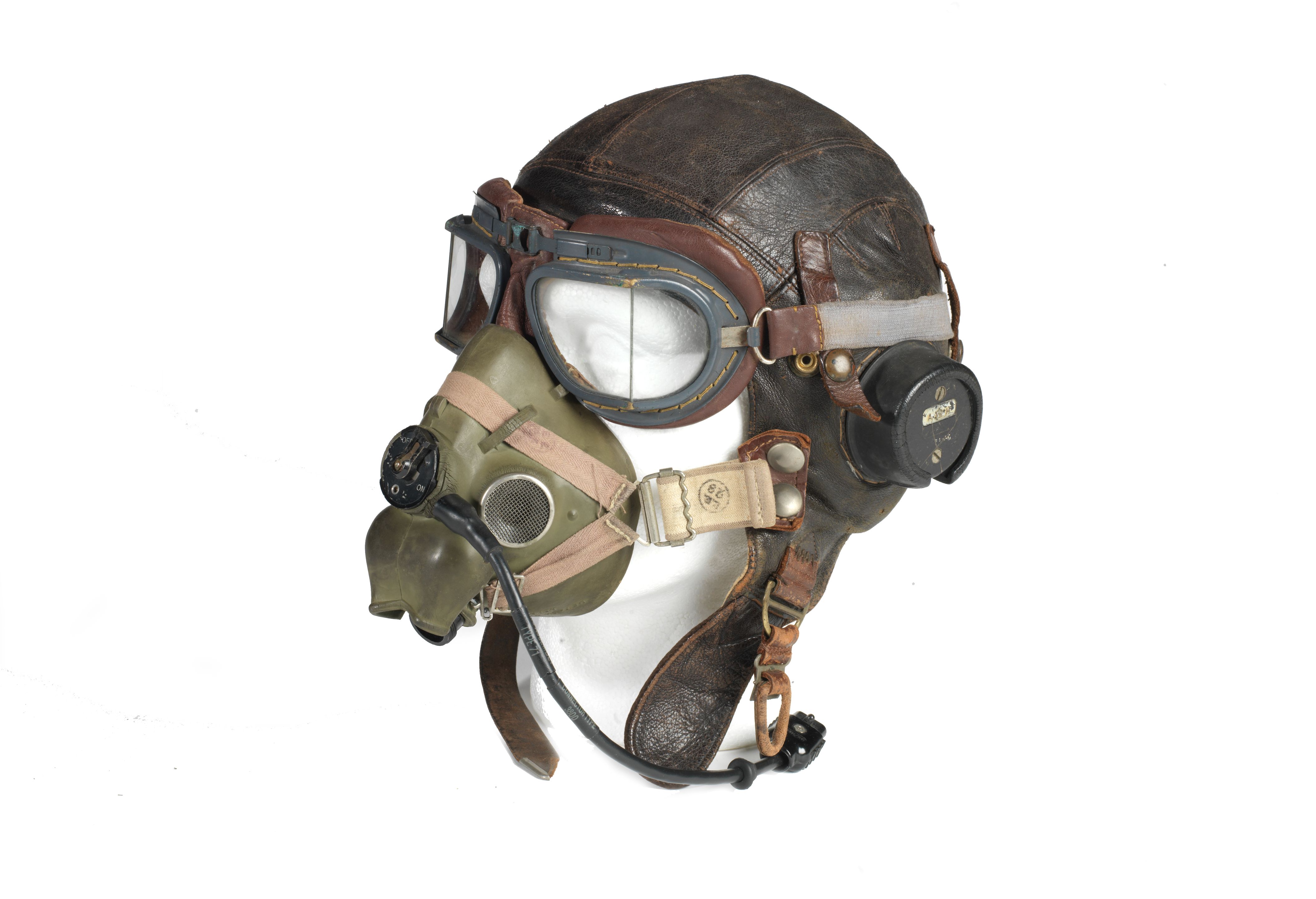 Bonhams Cars A WWII RAF Flying helmet, goggles and mask, worn by