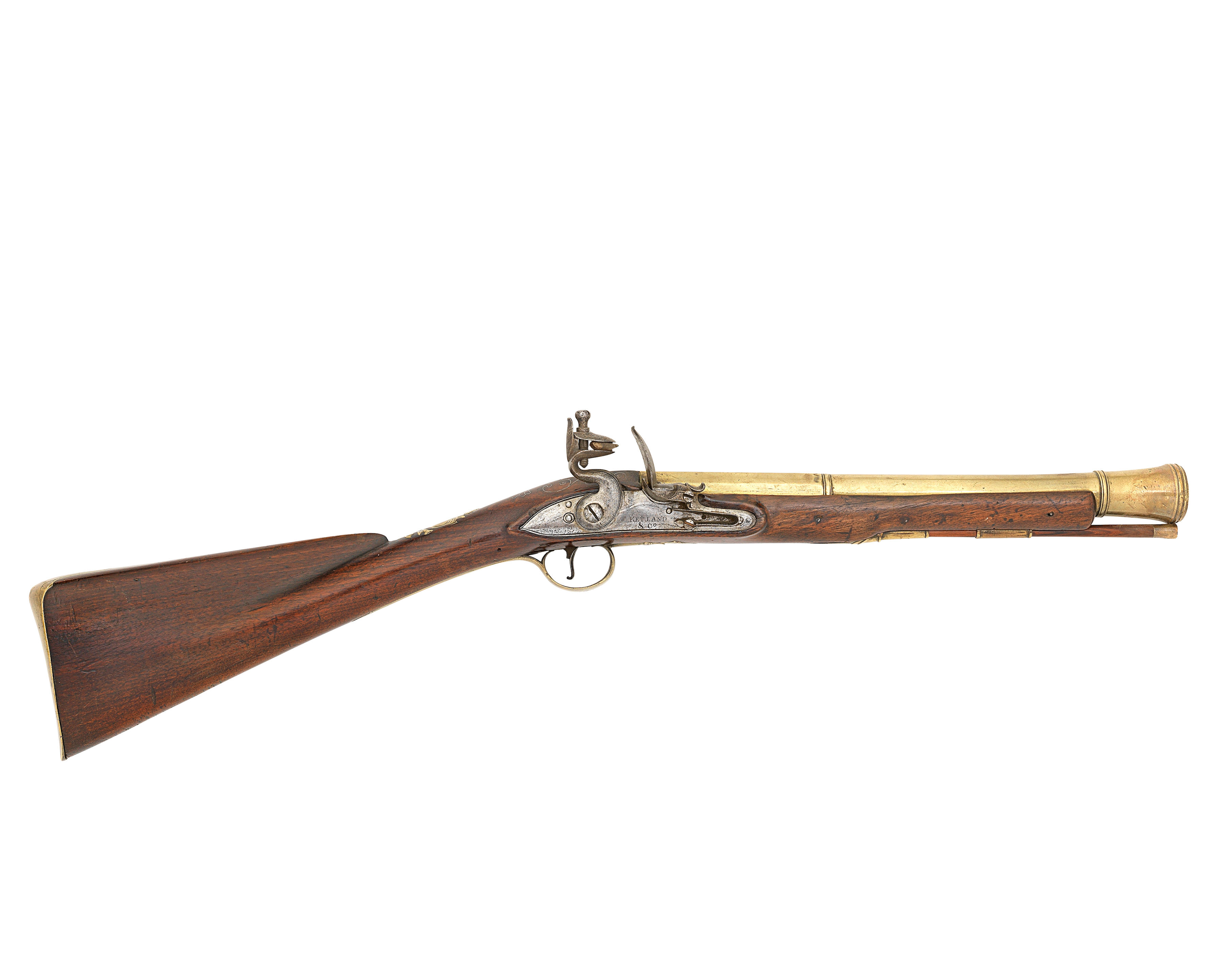 A FLINTLOCK BRASS BARRELLED BLUNDERBUSS PISTOL BY NOCK, 3inch two-stage  barrel with flared muzzle, border engraved action decorated with stands of  arms and signed H.NOCK LONDON, sliding safety, chequered wooden butt. Cock