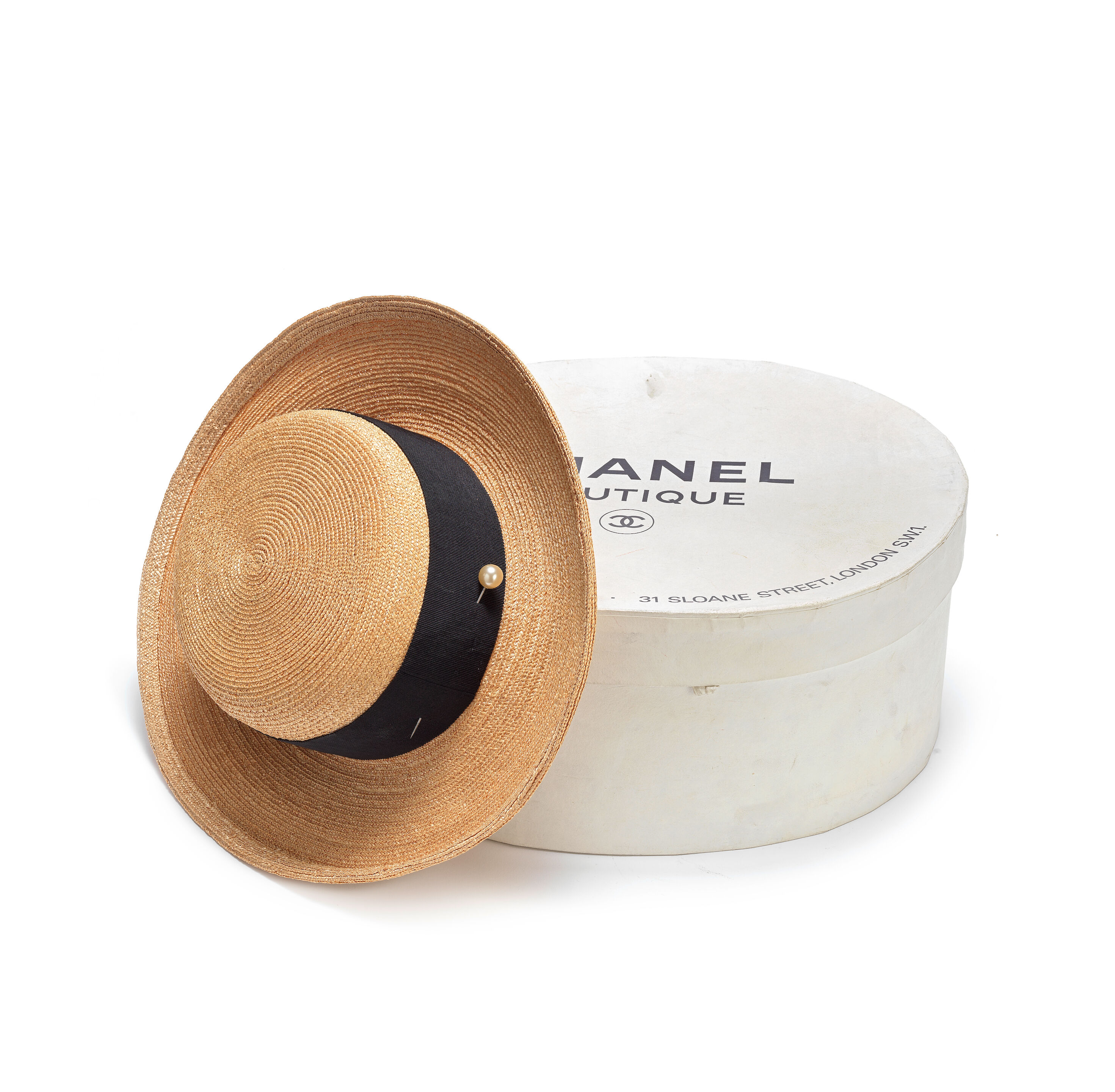 Bonhams : A NATURAL STRAW BOATER HAT Chanel, 1990s (includes 