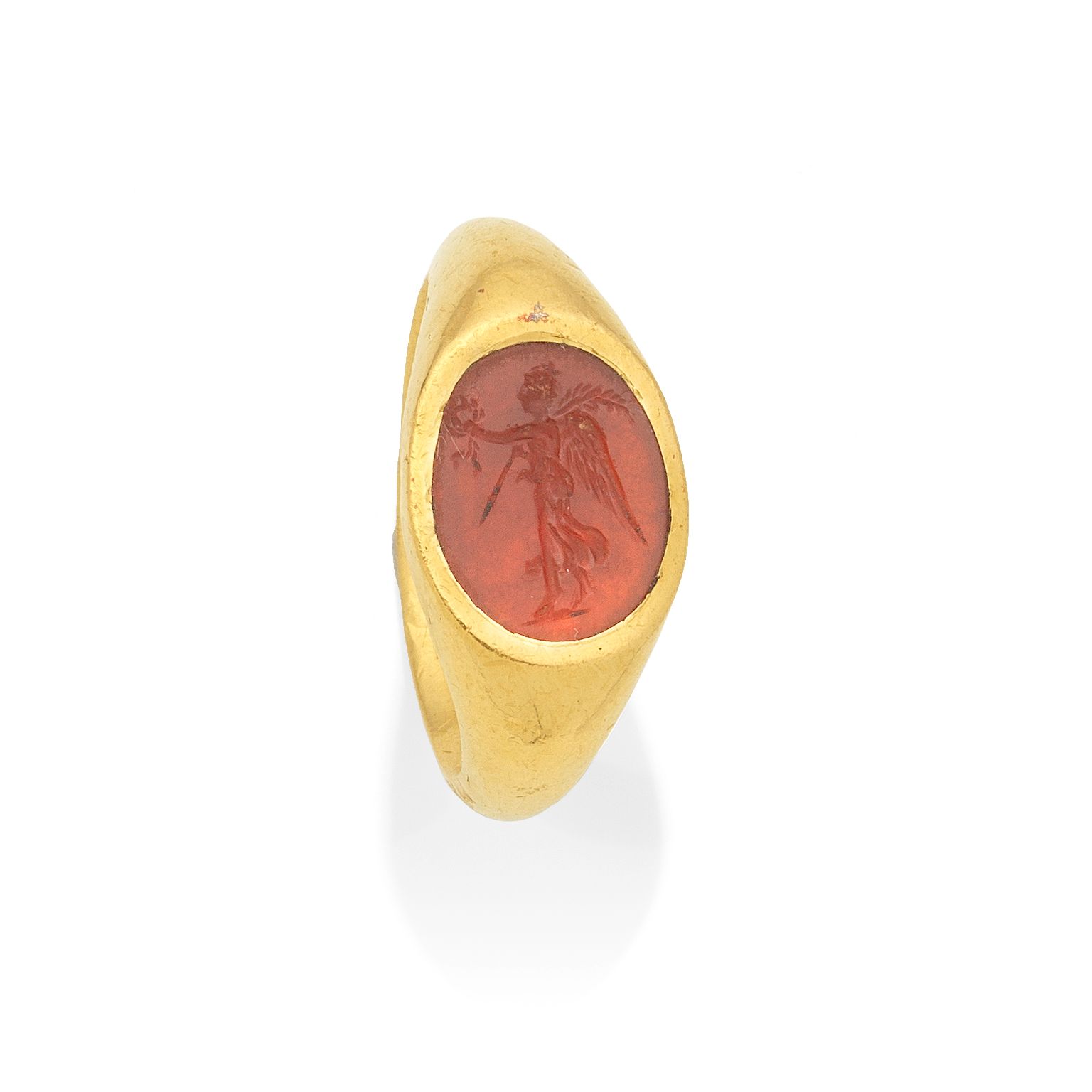 Bonhams A Roman gold and carnelian intaglio ring with Nike