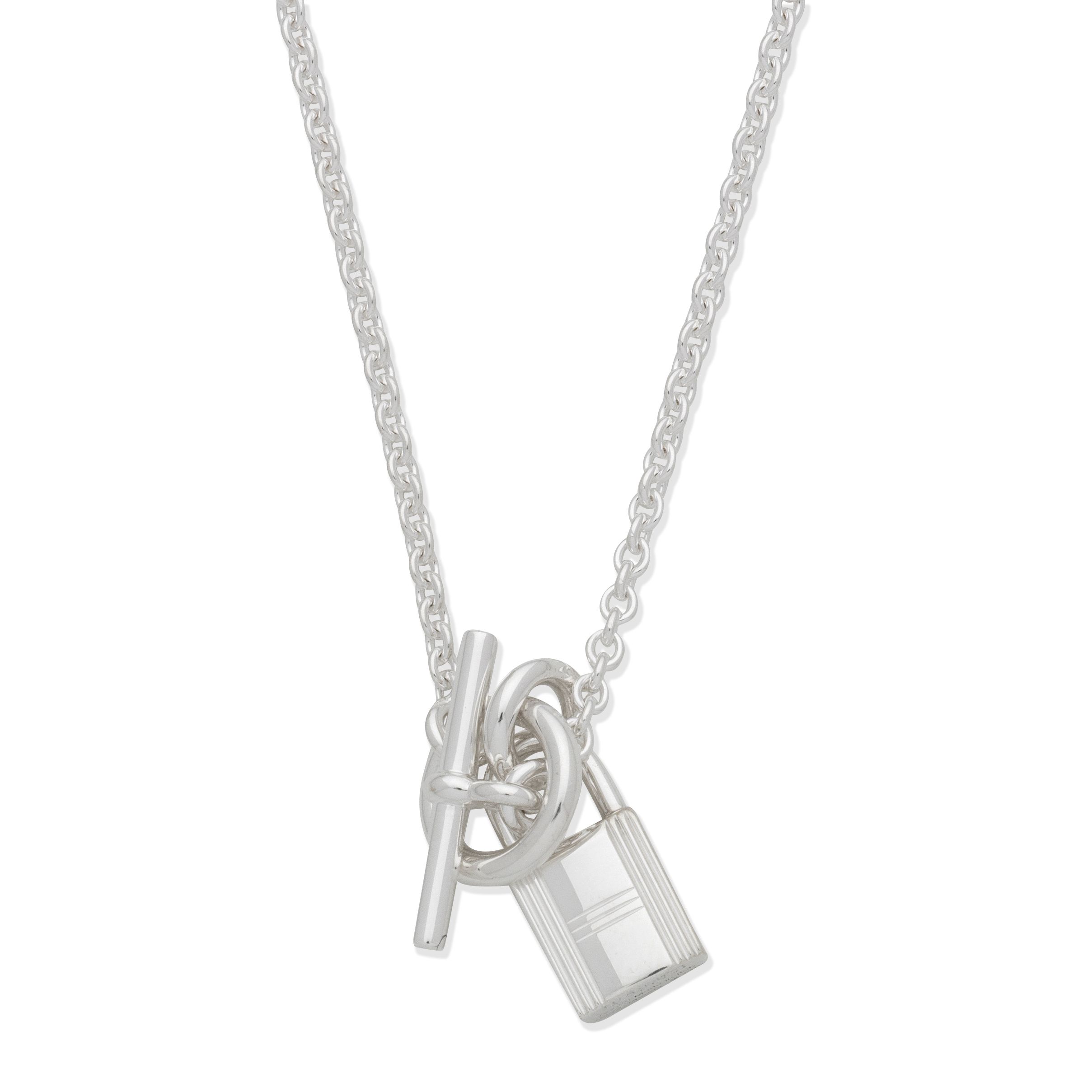 Bonhams Hermès: a Sterling Silver Kelly Cadenas Lock Pendant