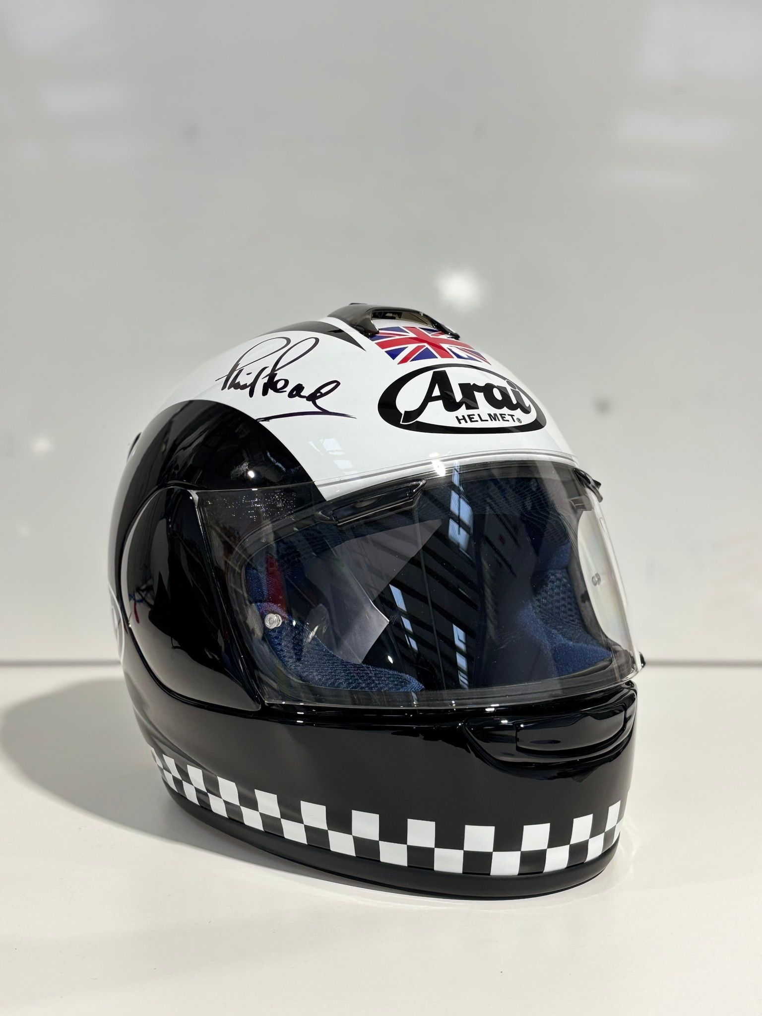 Bonhams Cars : A Signed Arai Replica Phil Read Helmet, together