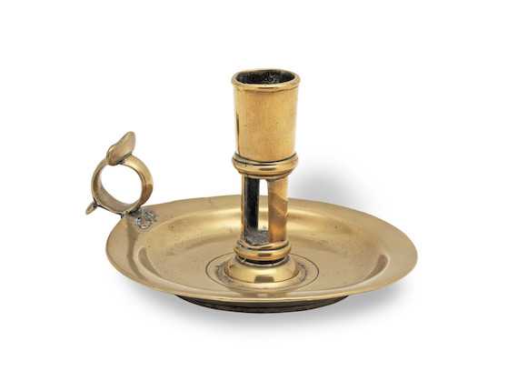 Bonhams : A mid-18th century cast brass chamberstick, English